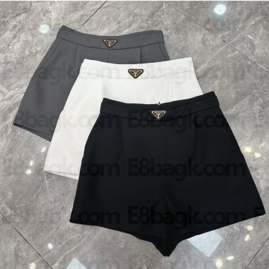Prada shorts with metal triangle logo 2025