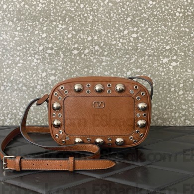 Valentino Garavani Nellcôte leather crossbody bag brown 2025