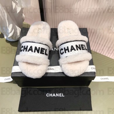 chanel logo flat mules with shearling white 2021