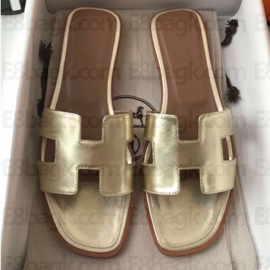 Hermes Oran Flat Slipper Sandals in Metallic Leather Gold