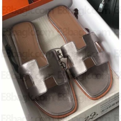 Hermes Oran Flat Slipper Sandals in Metallic Leather Gun Color