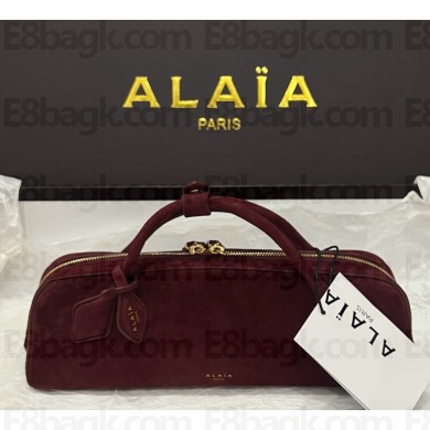 Alaïa  LE TECKEL CLUTCH IN SUEDE GOATSKIN burgundy 2025