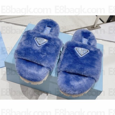 Prada Enameled metal triangle logo shearling Slide sandals Blue 2023