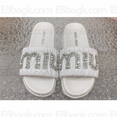 Miu Miu Matelassé nappa leather slides White with Crystal Logo 2024
