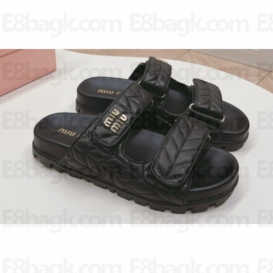 Miu Miu Matelassé nappa leather slides 5XX640 Black 2024