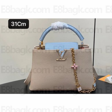 Louis Vuitton Lovelock chain Taurillon leather Capucines MM Bag Creamy 2024