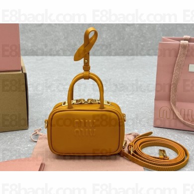 Miu Miu Leather micro bag 5NR036 Cognac 2024
