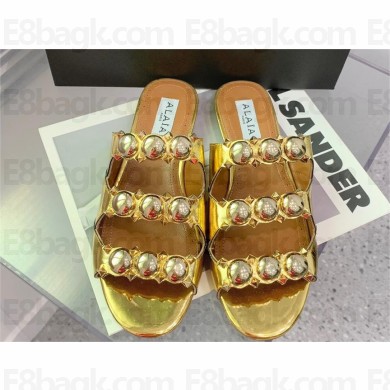 Alaia Bombe metallic leather sandals gold 2023