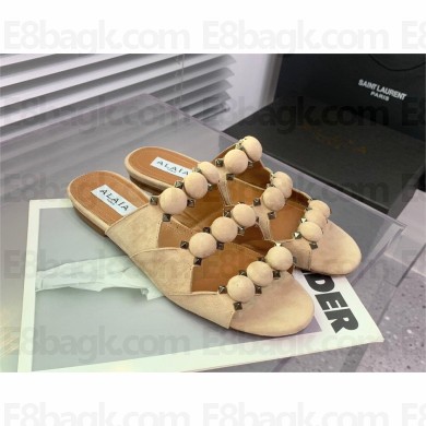 Alaia Bombe suede slides nude 2023