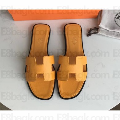 Hermes Oran Flat slippers in epsom leather yellow with black piping