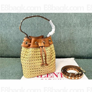 Valentino Garavani Rockstud raffia bucket bag 2024