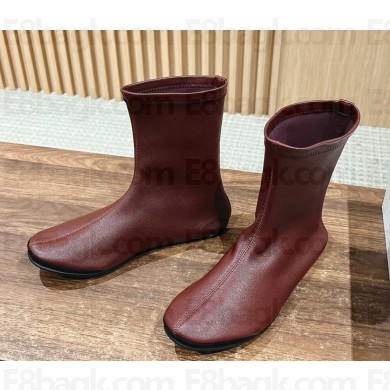 The Row Elastic sheepskin ankle boots in burgundy 2024