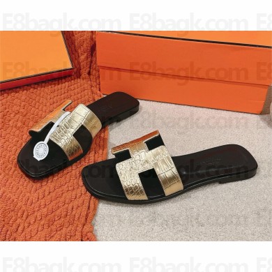 Hermes Oran flat Sandals in CROCODILE PATTERN GOLD/BLACK 2025