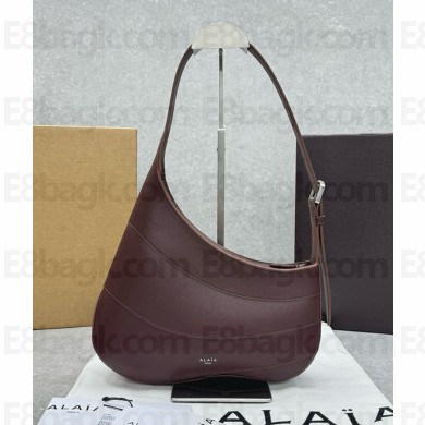 Alaia Djinn Wave Leather Shoulder Bag in burgundy 2024