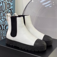 Chanel Calfskin Chelsea booties in white/black   Cs202