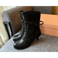 Miu Miu Leather laced booties 5U323E black 2024