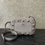 Valentino Garavani Nellcôte leather crossbody bag gray 2025
