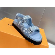 Louis Vuitton Paseo Flat Comfort Sandal in relaxed Monogram denim 2023
