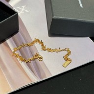 saint laurent CASSANDRE multi-charm bracelet in metal gold 2024