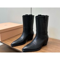 MIU MIU leather boots in black 2025