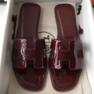 Hermes Oran Flat Slipper Sandals in Patent Calfskin Burgundy