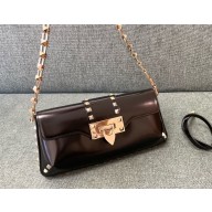 VALENTINO Rockstud black leather baguette bag 2024