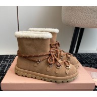 Miu Miu lace-up shearling suede booties in brown 2024