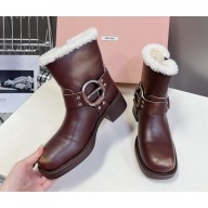 Miu Miu leather Shearling biker boots in brown 2024