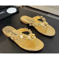 Chanel flat Camellia flip-flops gold 2025