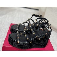 Valentino Garavani Rockstud 100mm wedge espadrilles black 2025