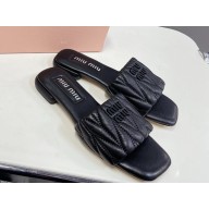 MIU MIU Matelassé nappa leather slides 5XX605 black 2025