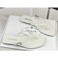 Prada enamel triangle-logo slides white leather 2025