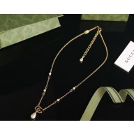 Gucci GG Marmont pendant necklace 815310 Metal with yellow gold-toned finish 2025