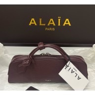 Alaïa LE TECKEL CLUTCH IN SHINY GOATSKIN burgundy 2025