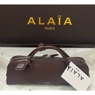 Alaïa LE TECKEL CLUTCH IN SHINY GOATSKIN coffee 2025