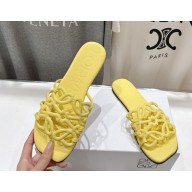 Loewe Petal Anagram slide in soft calfskin yellow 2025