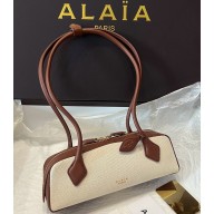Alaïa LE TECKEL SMALL BAG IN CANVAS AND NUBUCK UMBER 2025