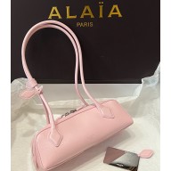 Alaïa  LE TECKEL SMALL BI-MATERIAL BAG IN LEATHER pink 2025