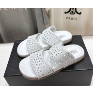 Alaïa Laser-cut leather slides white 2025
