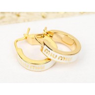 Miu Miu Enameled metal earrings white 2024