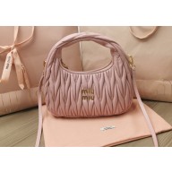 Miu Miu Wander matelassé nappa leather mini hobo bag 5BC125 Nude Pink