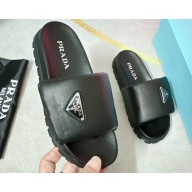 Prada Soft padded nappa leather slides 1XX648 Black 2023