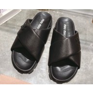 Miu Miu Leather slides Black with metal lettering logo 2023