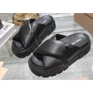 Miu Miu Leather Platform slides Black with metal lettering logo 2023