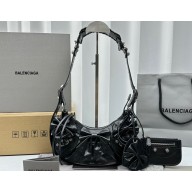 Balenciaga Le Cagole XS Shoulder Bag in Arena lambskin Black with Bow