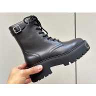 Celine Bulky Lace-Up Boots With Buckle Details and Studded Outsole In Shiny Bull Black 2023