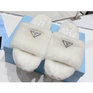 Prada Enameled metal triangle logo shearling Slide sandals White 2023