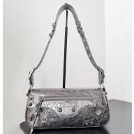 Balenciaga Le Cagole Small Sling Bag in Arena calfskin Silver Spring 2024