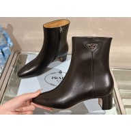 Prada Leather booties Black with Enameled metal triangle logo 1T192N 2024