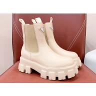 Prada Monolith brushed leather booties Beige with Enameled metal triangle logo 1T256N 2024